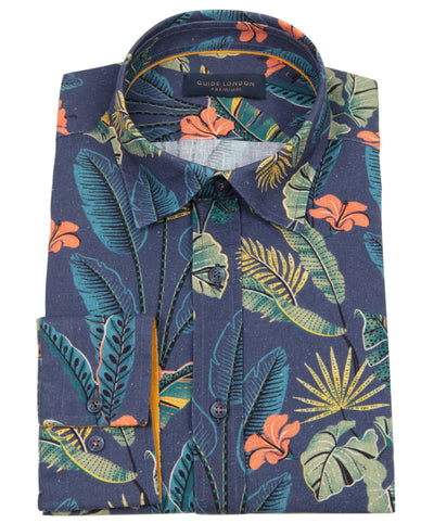 A folded tropical Leaf Pattern Shirt in Navy with Green and Orange Accents