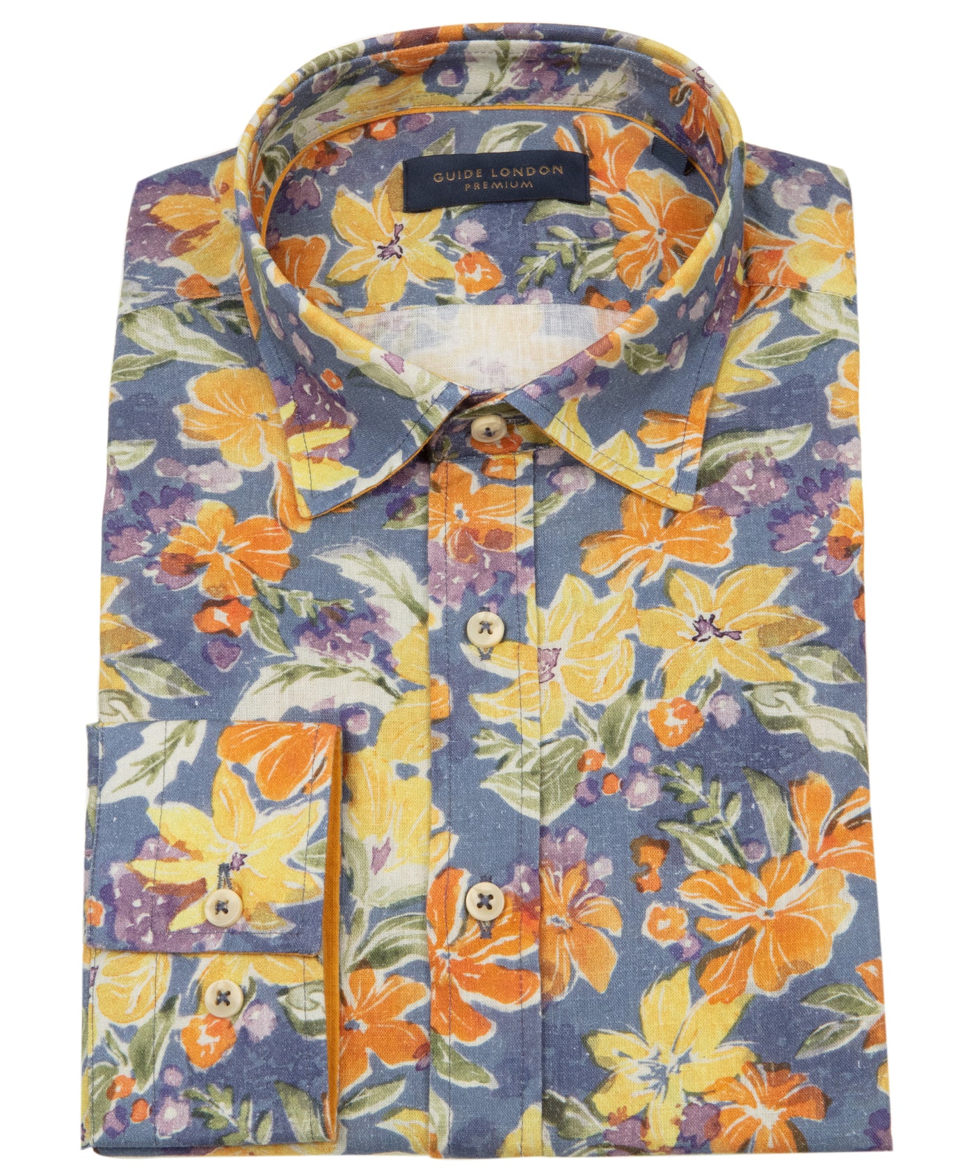 Folded Tropical Paradise Long Sleeve Shirt with yellow, orange and navy floral pattern on White Background